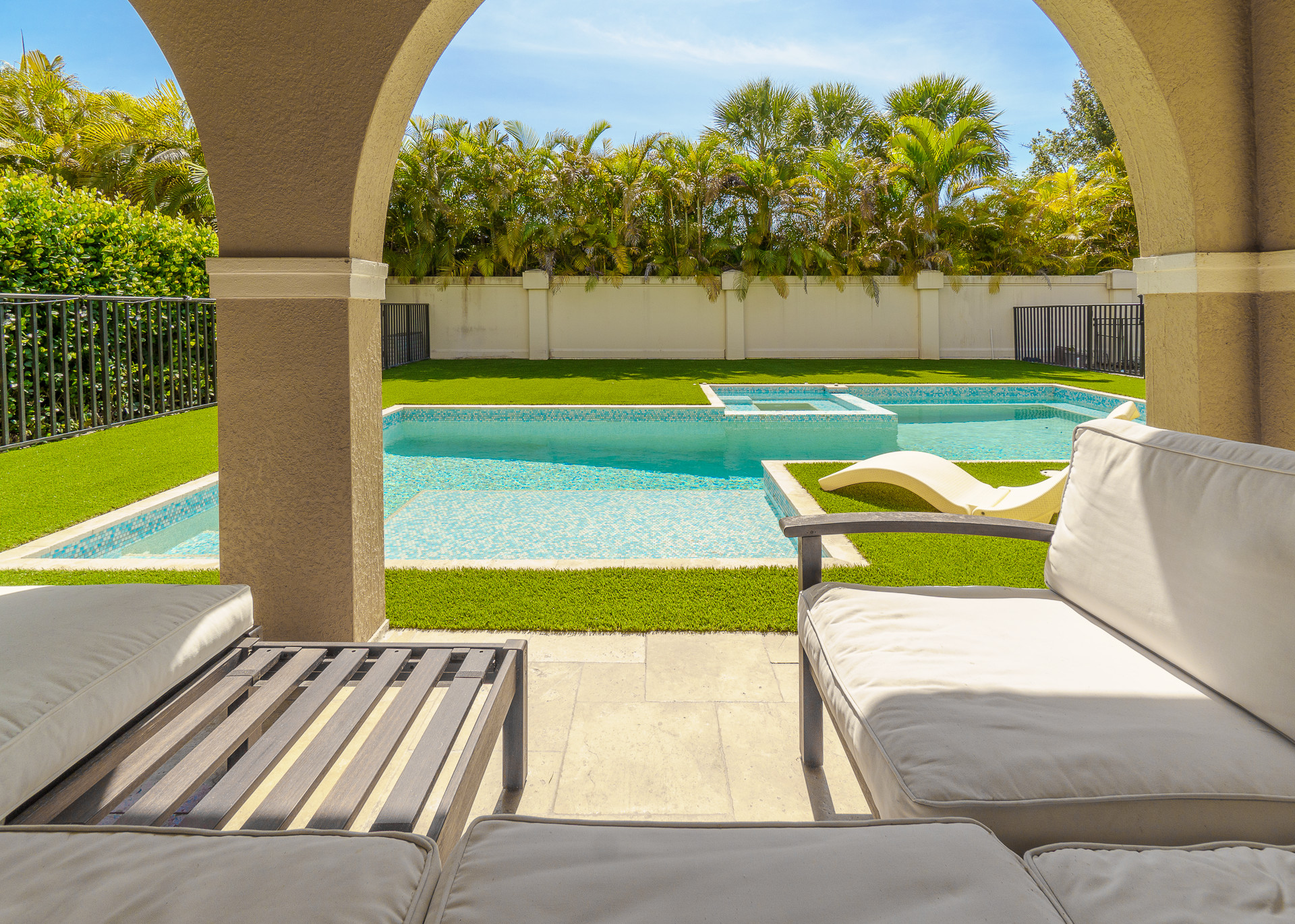 outside pool area with covered patio