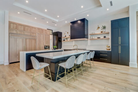 kitchen with appliances and custom cabinets