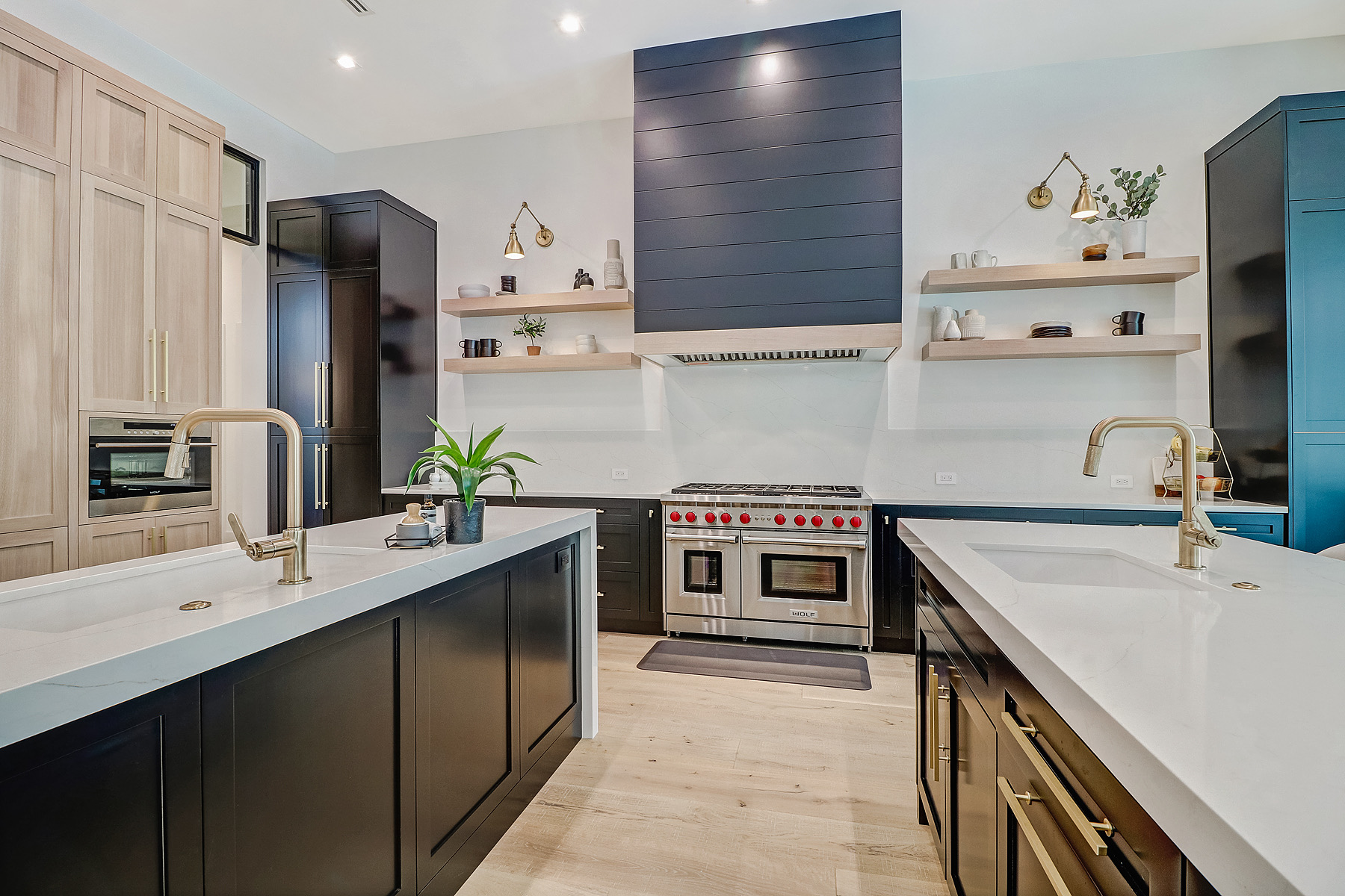 kitchen with appliances and custom cabinets