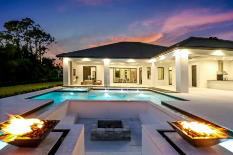 outdoor area of custom built home at sunset by bellamia development