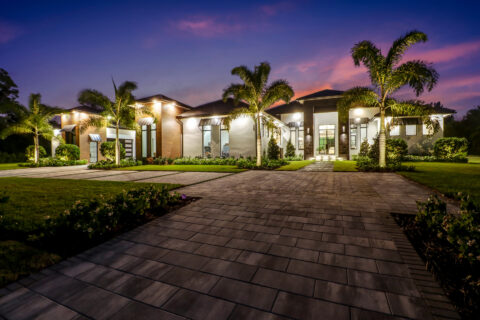 custom built home at sunset by bellamia development